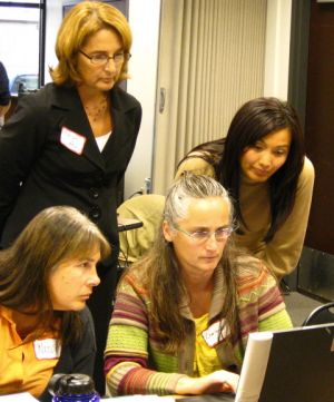 Klamath Falls City Schools staff pouring over data in Excel